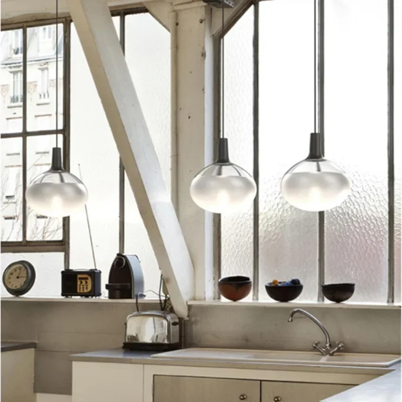 Glass pendant over a kitchen island