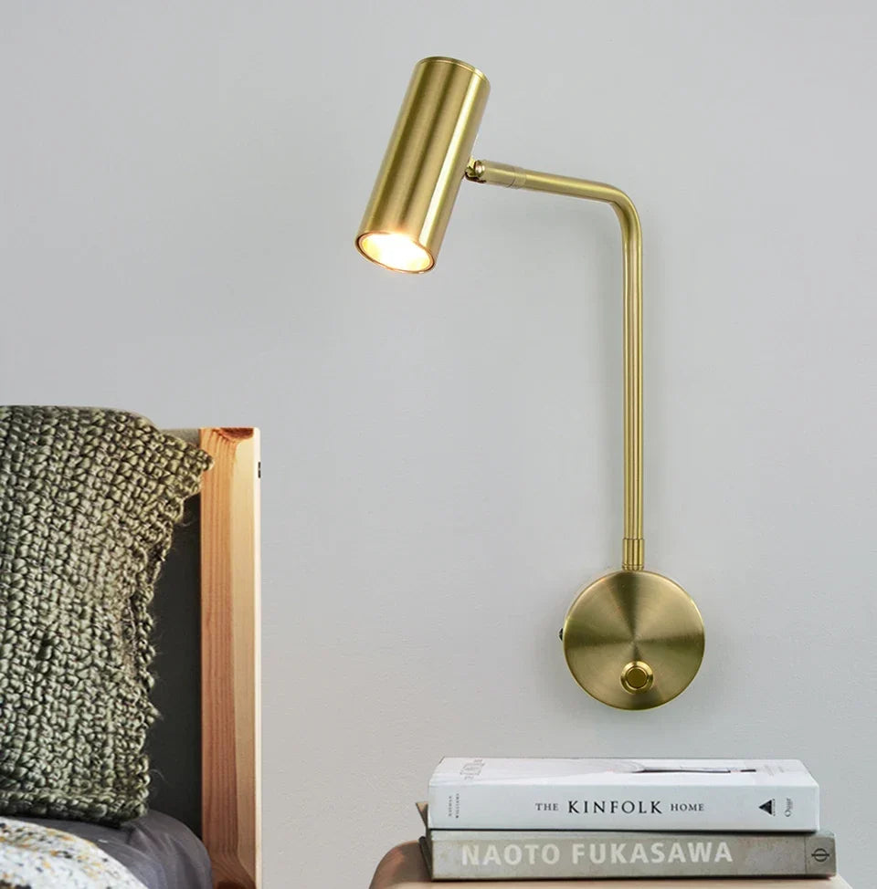 Adjustable gold LED wall light with switch