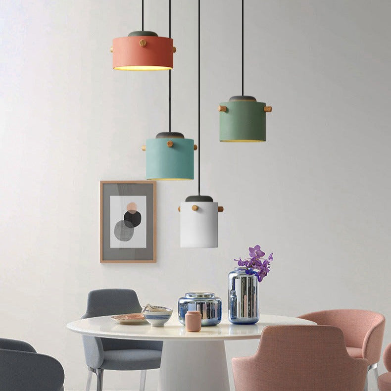 Pastel pendants over a kitchen counter