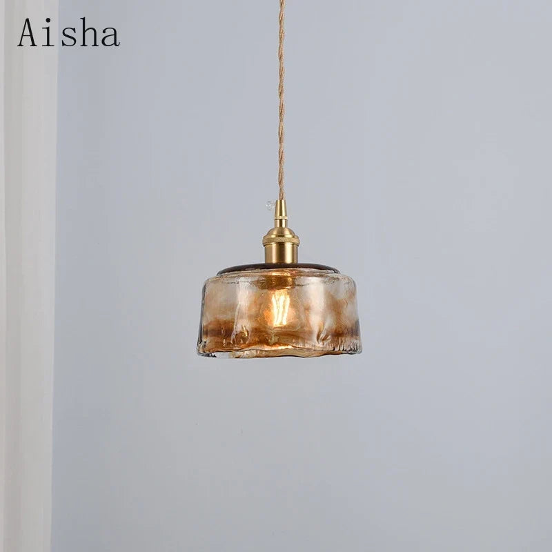 Glass pendants over a bar