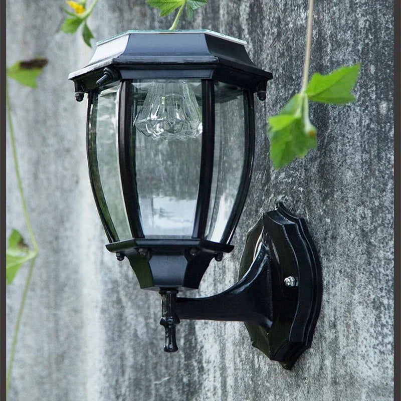 Solar wall light on a garden fence