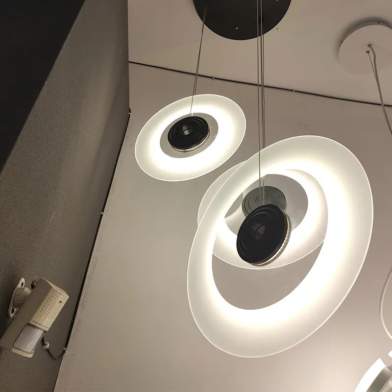 Black round pendant over a kitchen