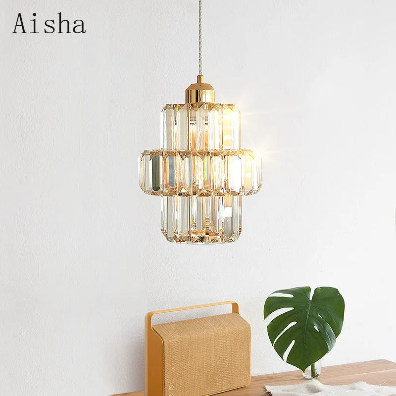 Gold crystal pendant in a hallway
