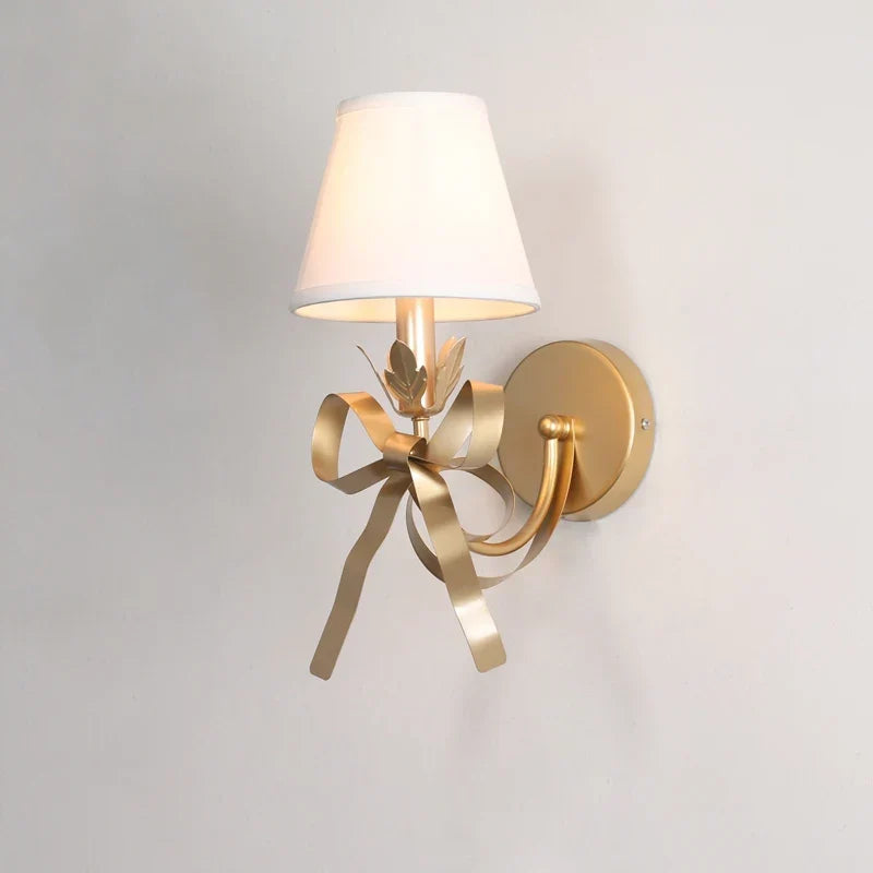 Bow wall light in a girls room