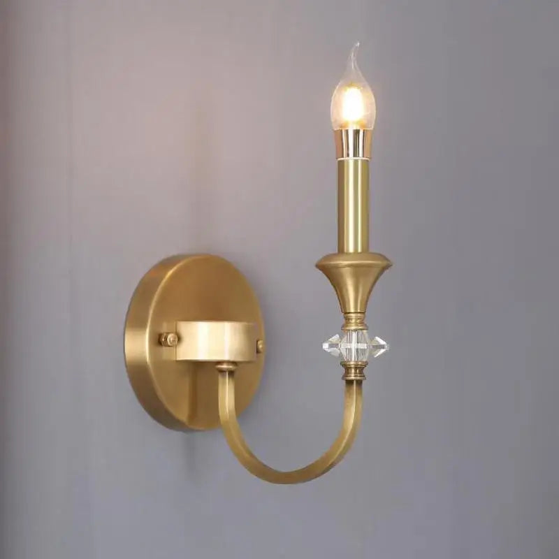 Gold candle sconce