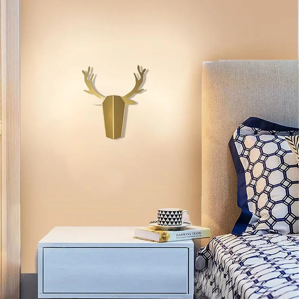 Minimal deer sconce