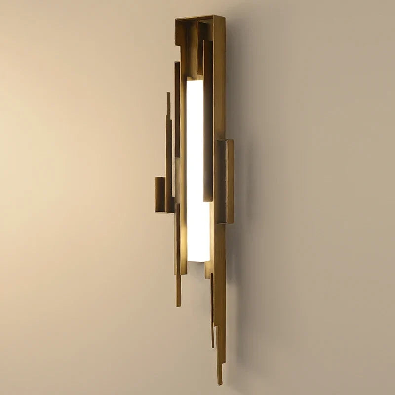 Sculpted gold wall light