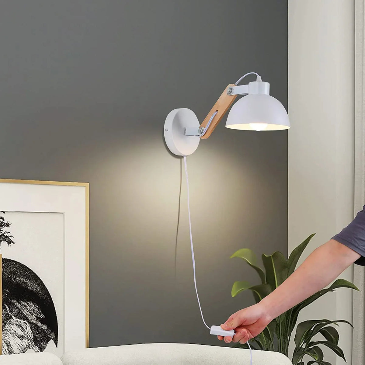 Black minimal sconce in a hallway