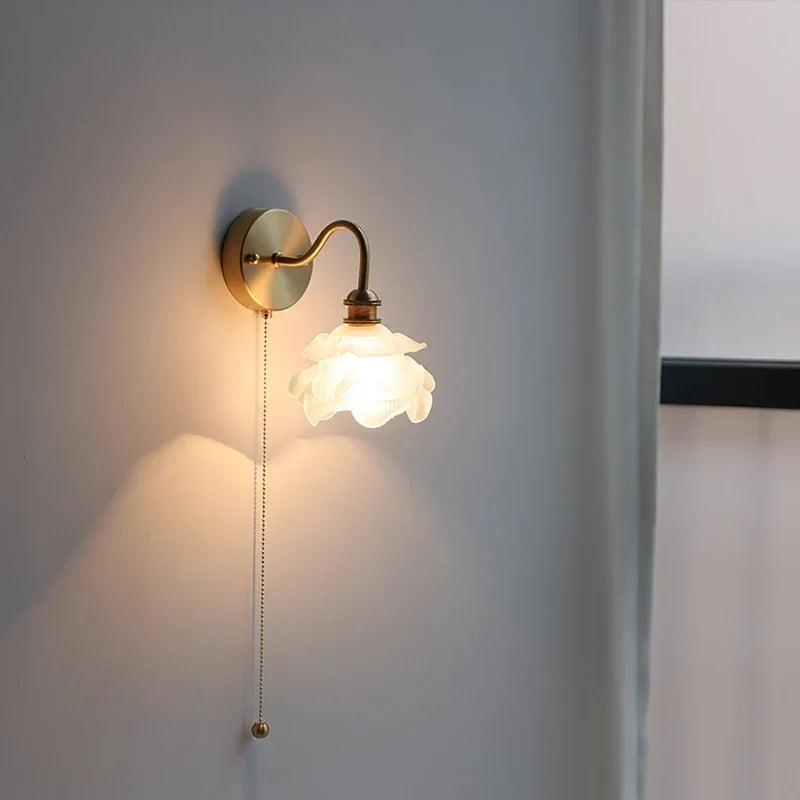 Flower glass wall light in a bathroom