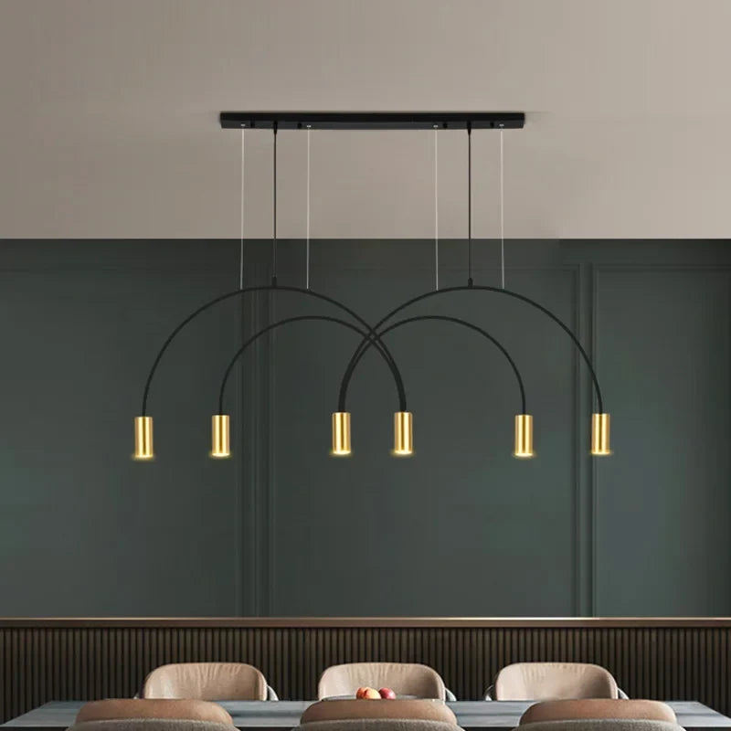 Gold multi-light pendant over a dining table