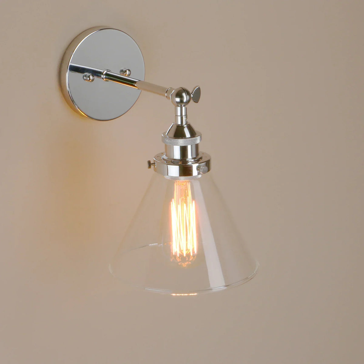 Chrome wall light in a hallway