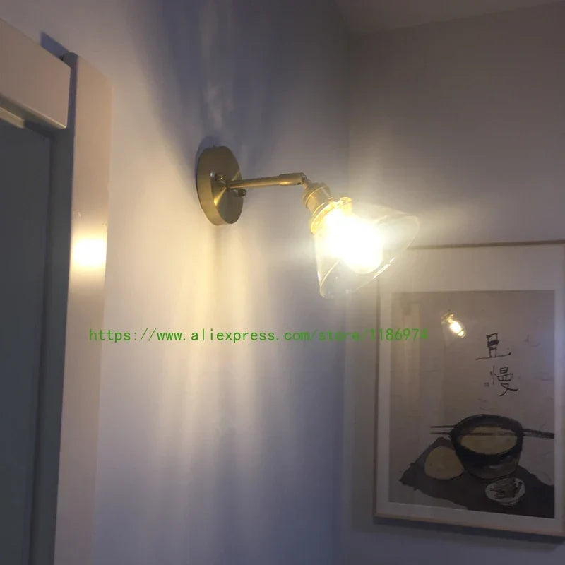 Gold glass sconce
