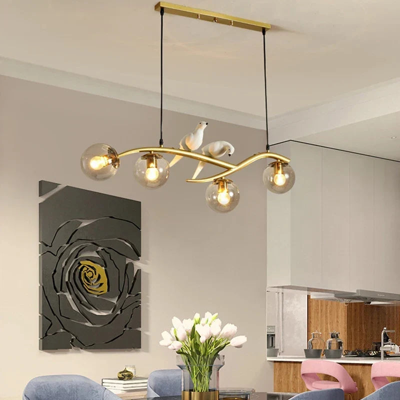 Gold 4-head pendant over a table