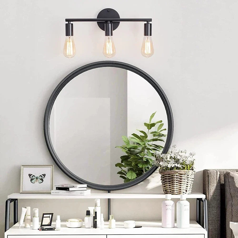 Vintage mirror wall light in a hallway