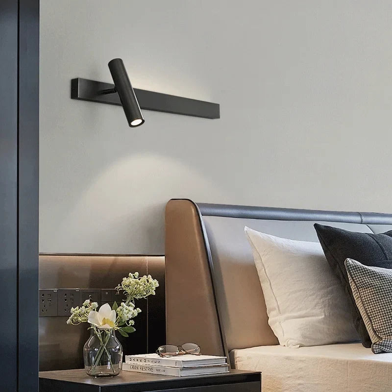 Copper linear sconce in a bedroom