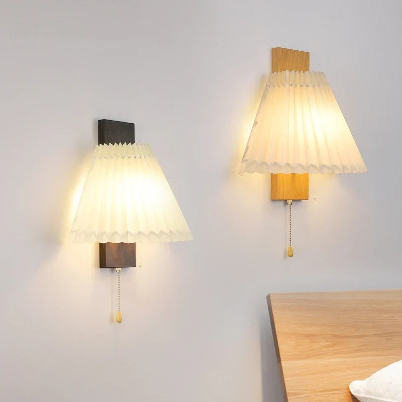 Pleated wood wall sconce with switch