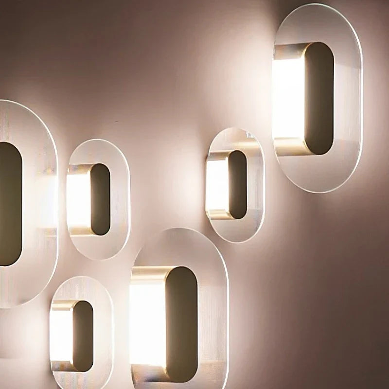Gold elliptical glass wall light