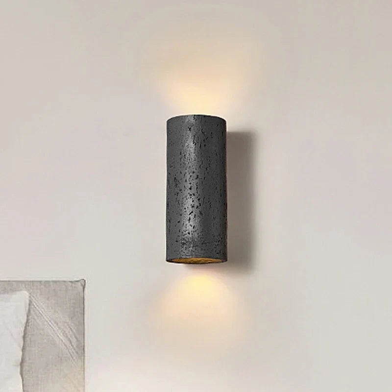 Cement wall light in a hallway