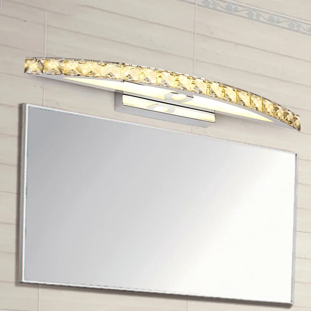 Crystal light above a bathroom mirror