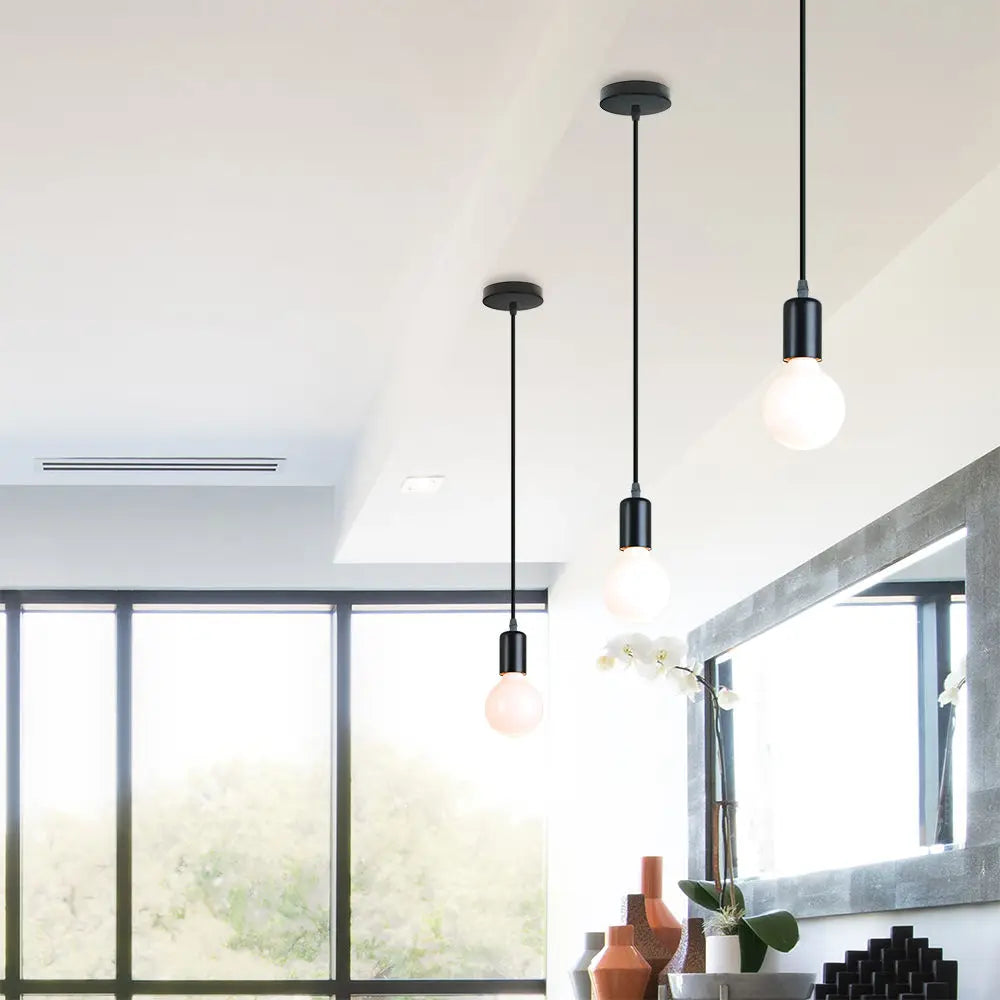 Black industrial pendant over a counter