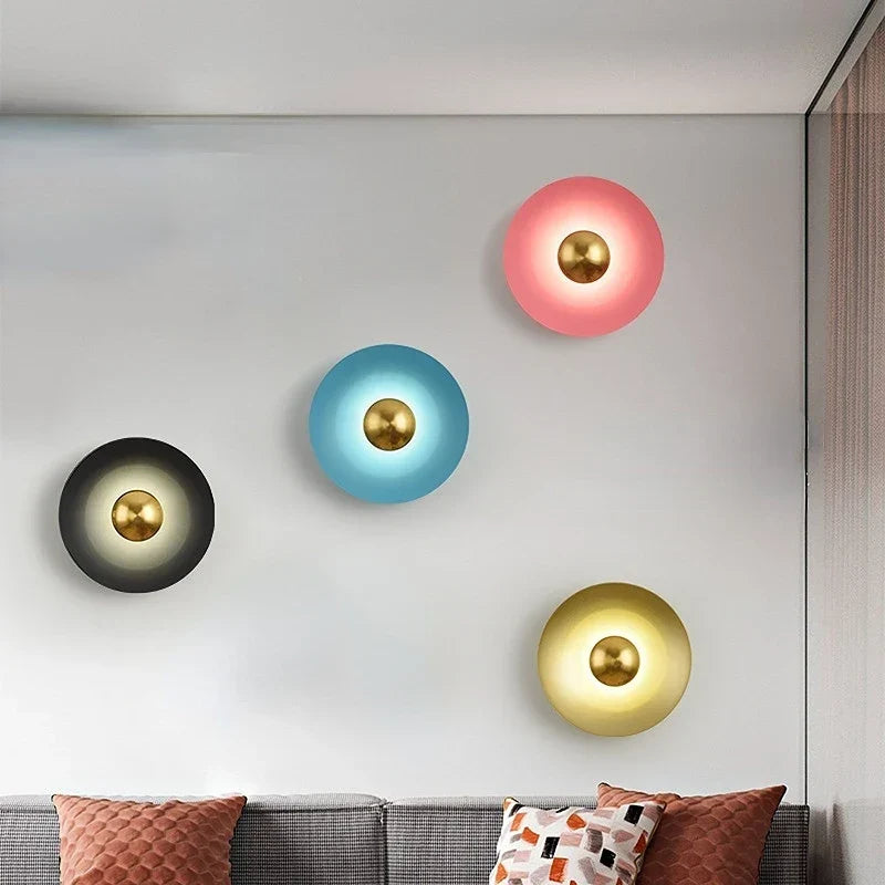 Red circle wall light in a bedroom