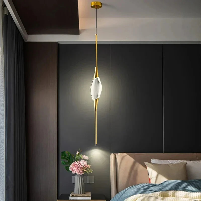 Brass crystal pendant over a table