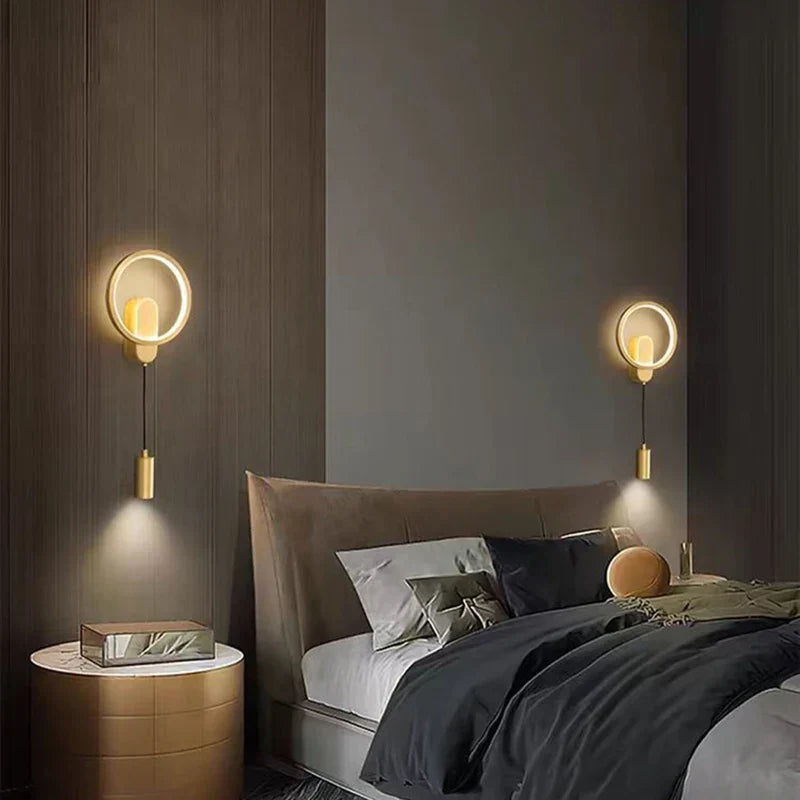 Brass wall light in a bedroom