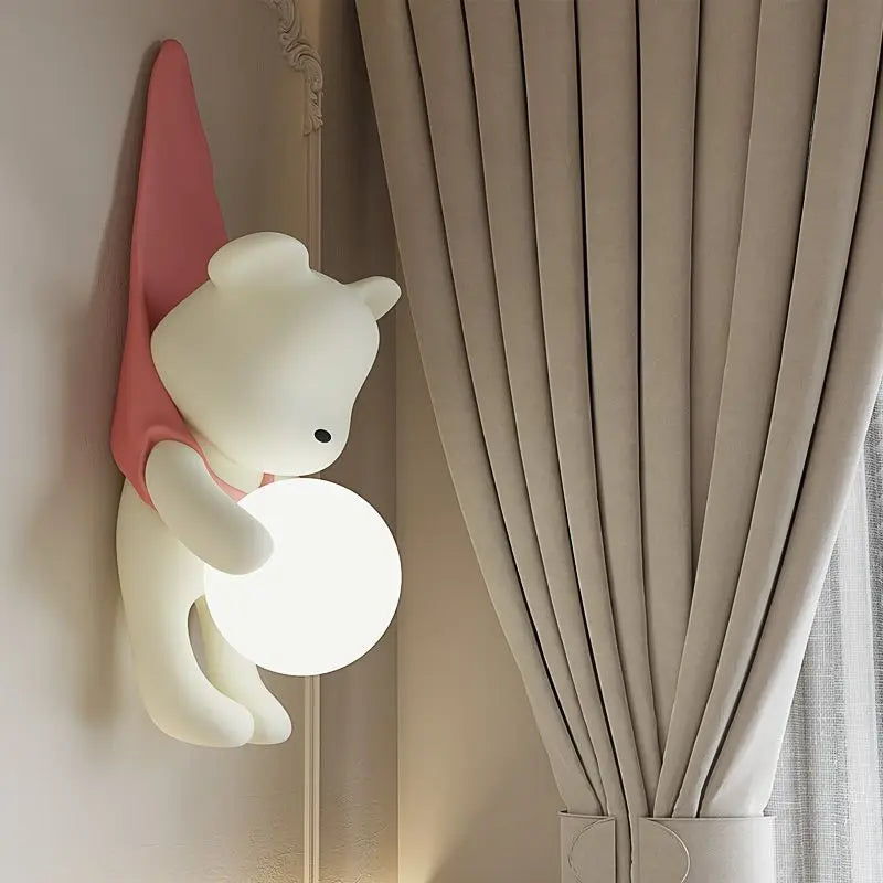Bear wall light in a nursery