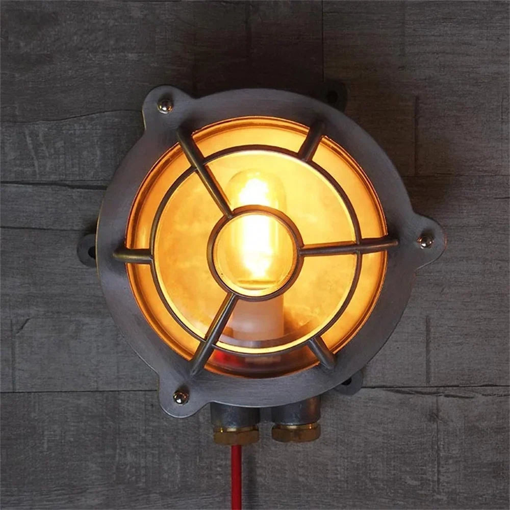 Iron sconce on a garden wall