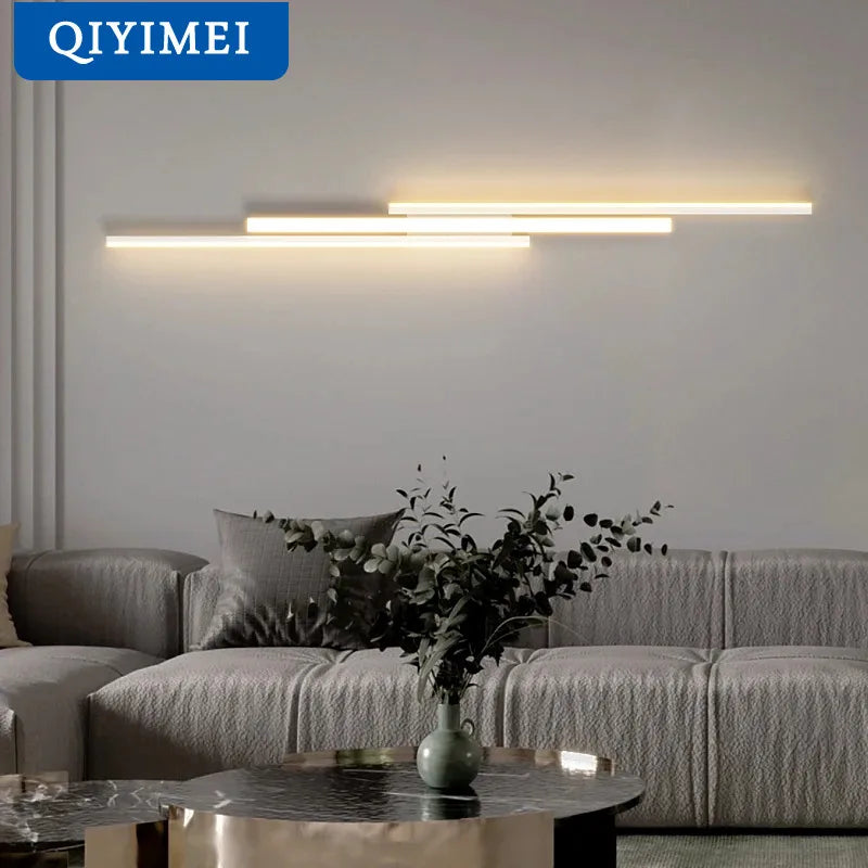 Linear LED wall light above a sofa
