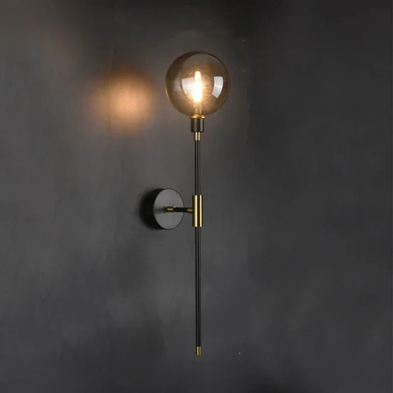 Iron wall light with glass ball