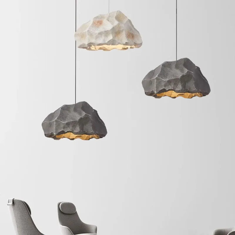 Gray stone pendant over a table