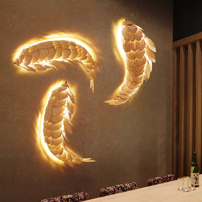 Wood fish wall light on a stairway