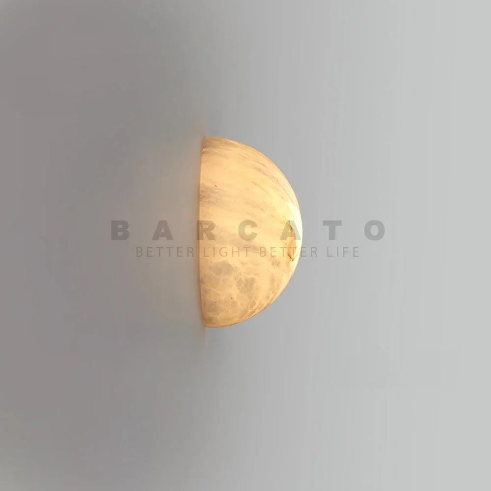 Round dolomite wall light