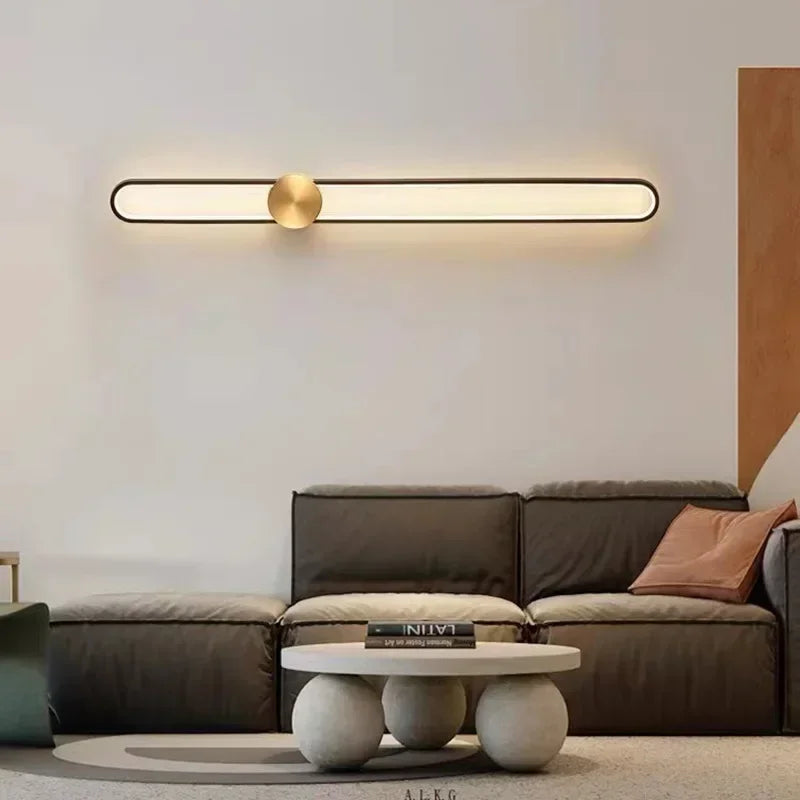 Linear wall light above a bed