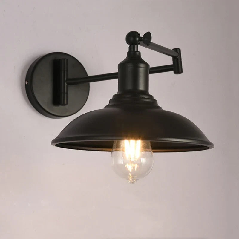 Copper swing sconce