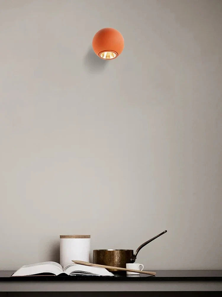 Orange glass sconce