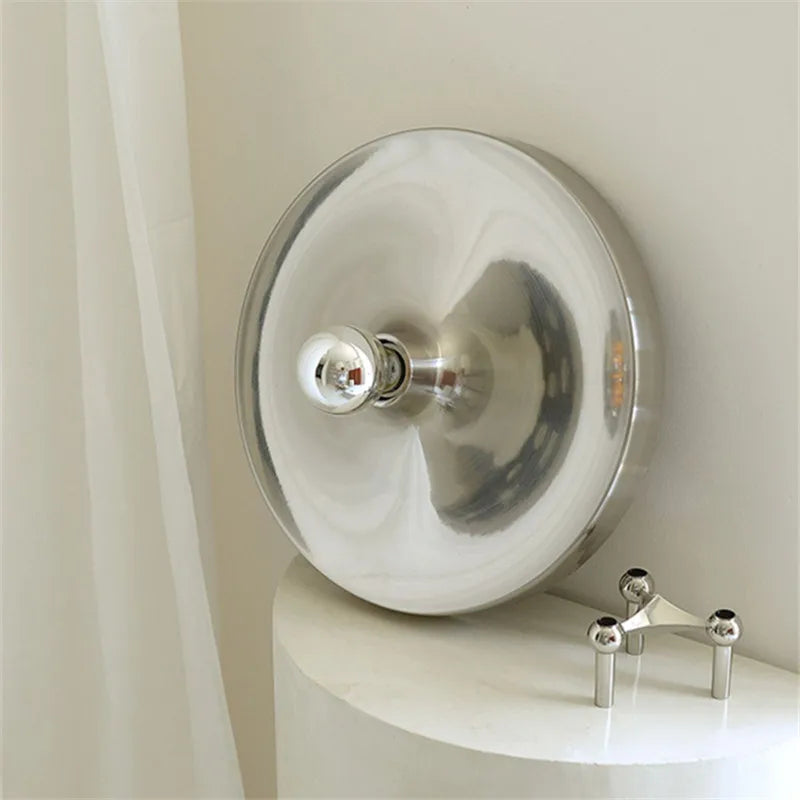 Flat chrome sconce