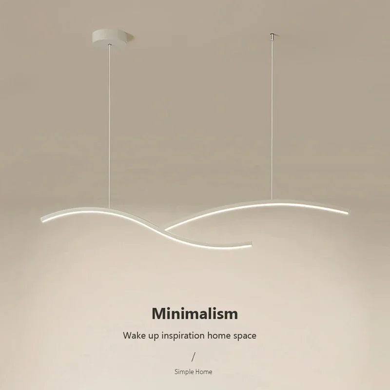 White linear pendant over a dining table