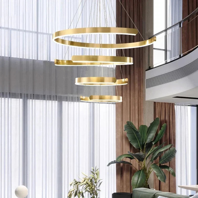 Gold ring pendant over a bar