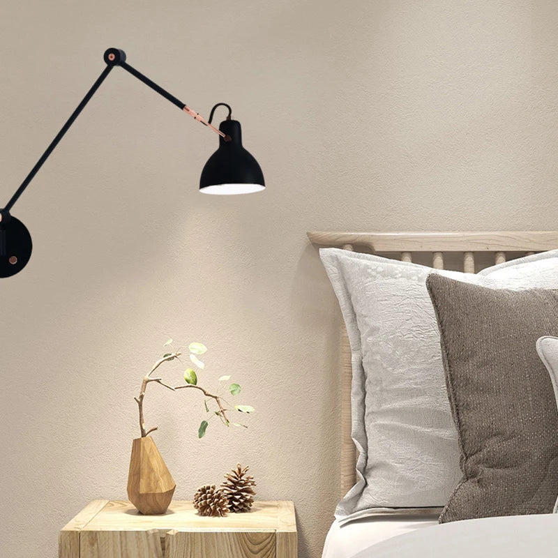 Articulated sconce over an armchair