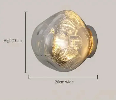 Smoked glass sconce in a hallway