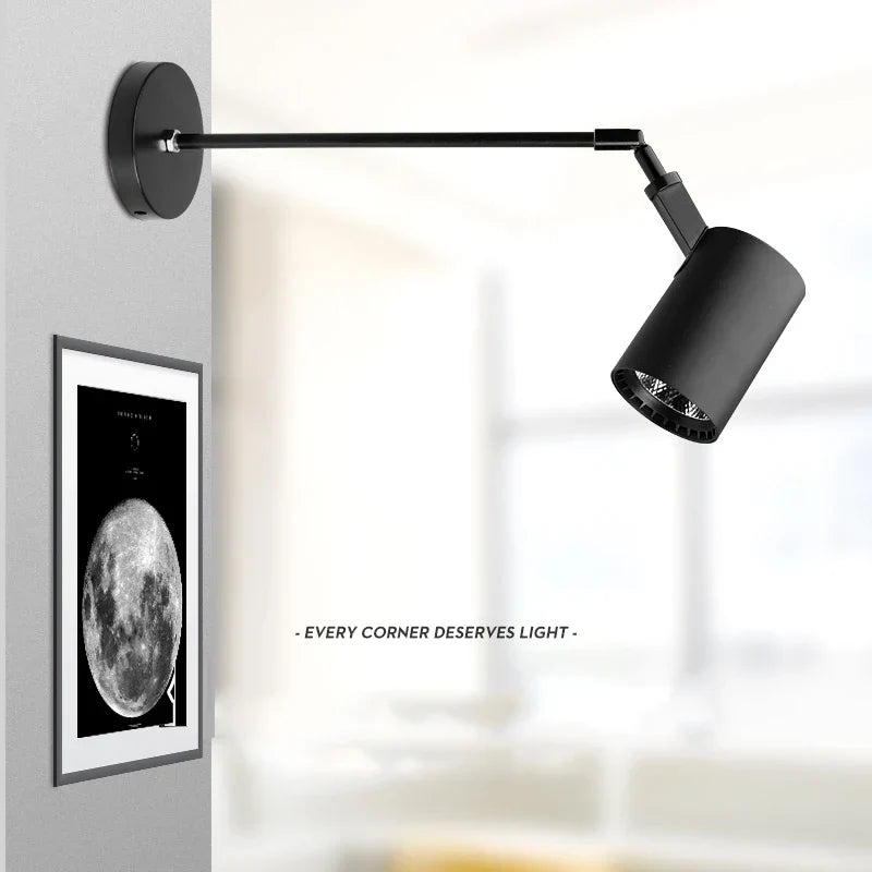 Telescopic arm wall light