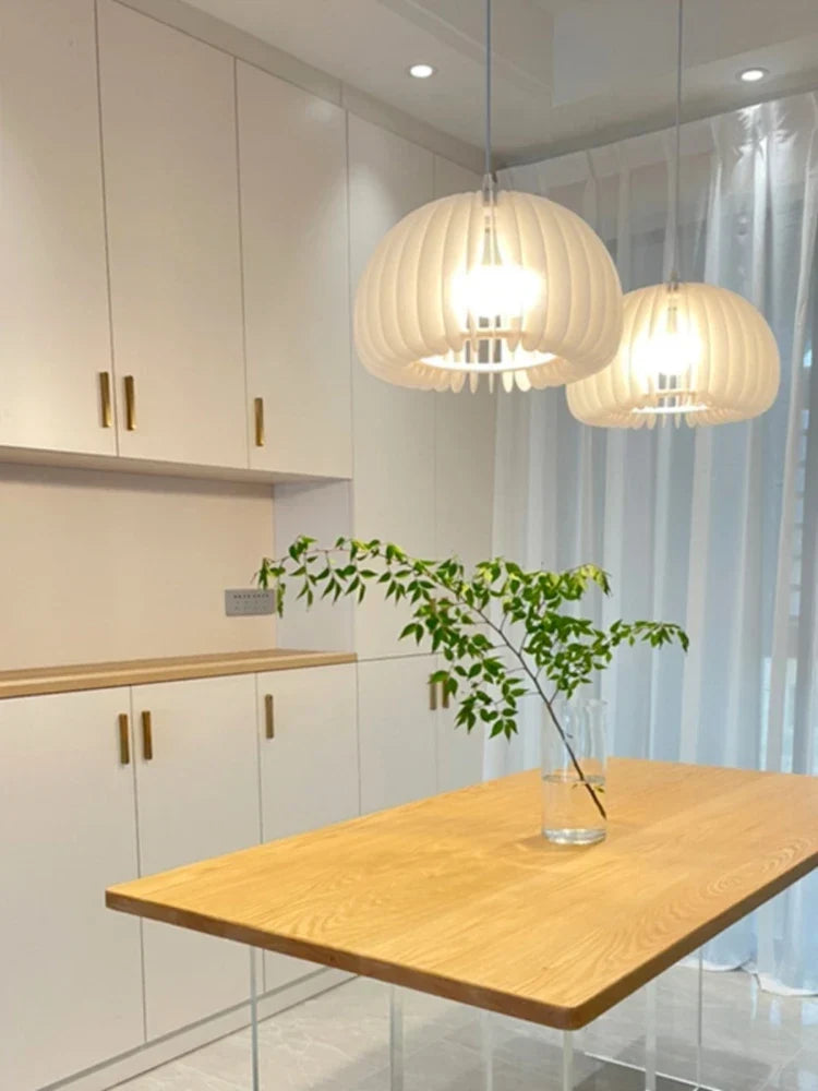 Cream pendant in a bedroom