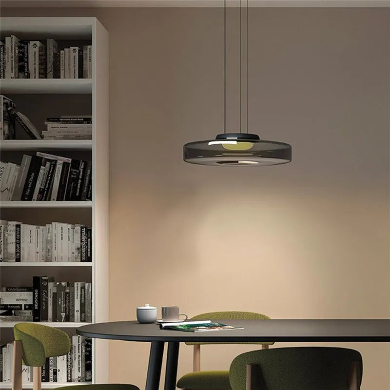 Green glass pendant over a kitchen