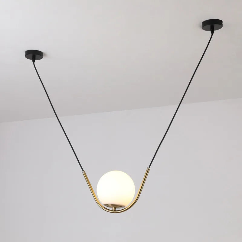 Gold glass pendant in a cafe