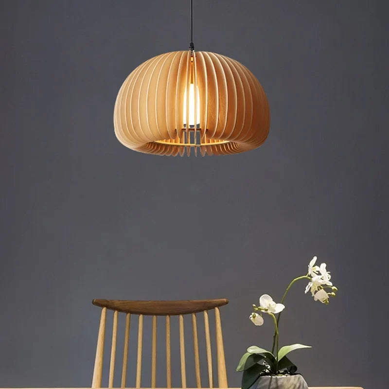 Wood pendants over a kitchen island