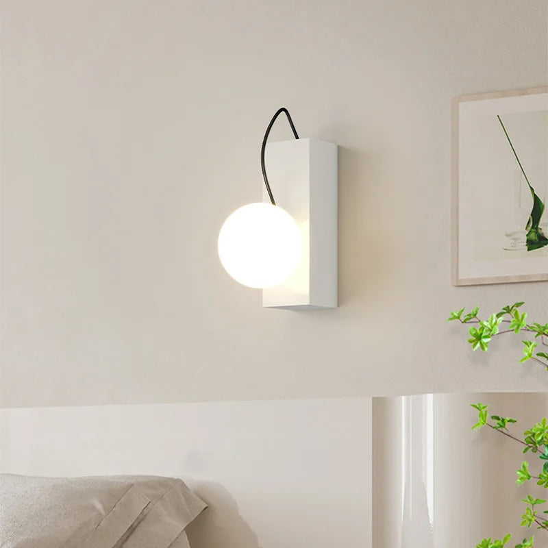 Red acrylic ball wall light