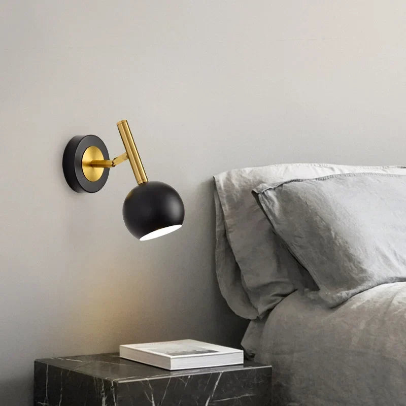 Gold reading sconce