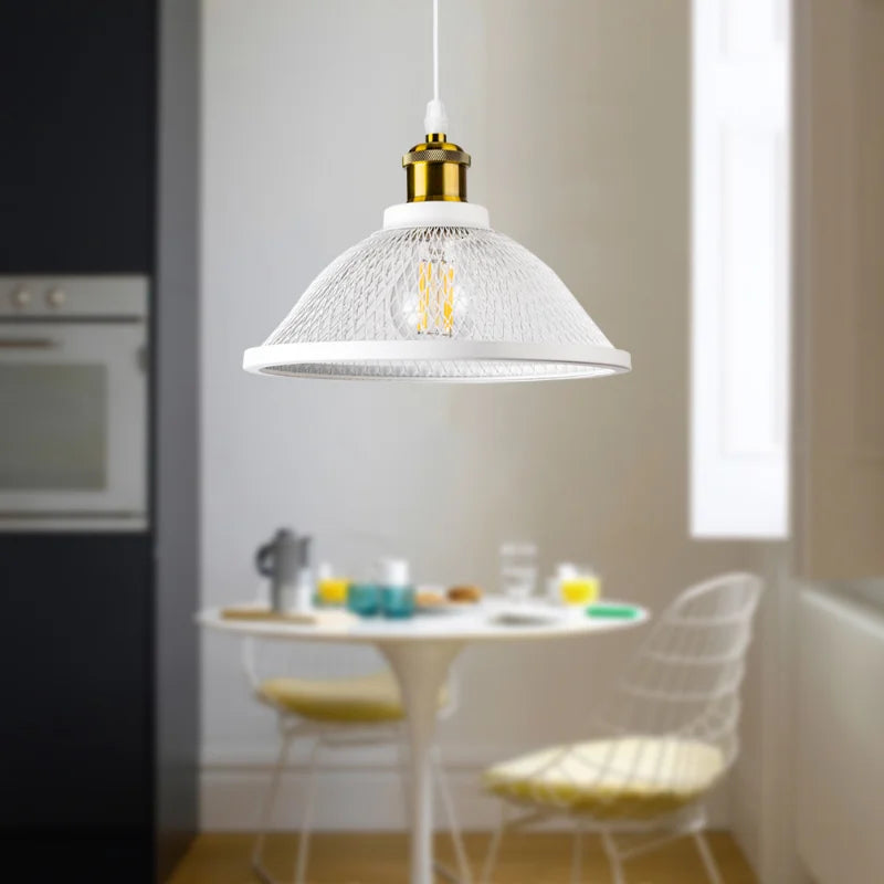 Black cage pendants over a bar
